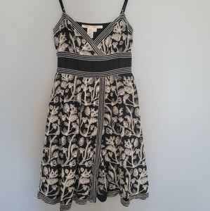 Black midi dress with white stitching